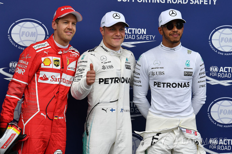 Ganador de la pole Valtteri Bottas, Mercedes AMG F1, segundo Sebastian Vettel, Ferrari, tercero Lewis Hamilton, Mercedes AMG F1