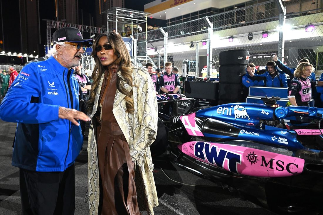 Flavio Briatore, Executive Advisor of Alpine F1 talks with Naomi Campbell