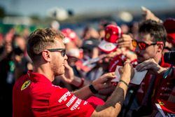 Sebastian Vettel, Ferrari signs autographs for the fans