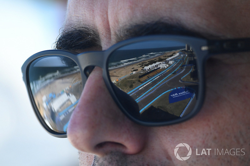 A spectator watches the action