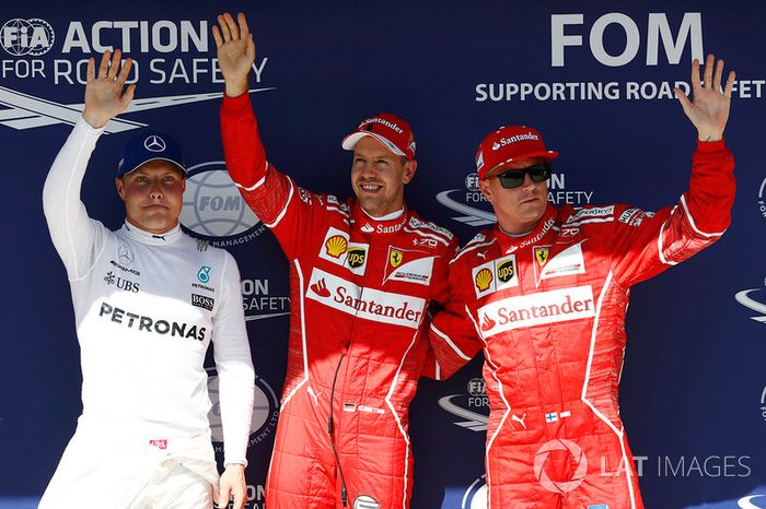 Ganador de la pole Sebastian Vettel, Ferrari, segundo puesto Kimi Raikkonen, Ferrari y el tercero Va