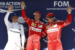 Polesitter Sebastian Vettel, Ferrari, second place Kimi Raikkonen, Ferrari, third place Valtteri Bot