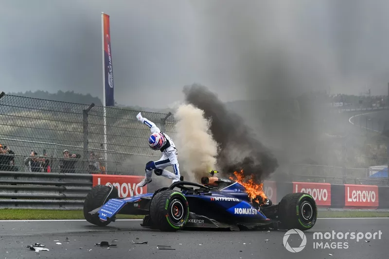 Logan Sargeant, Williams FW46, jumps out of his car after a crash in FP3