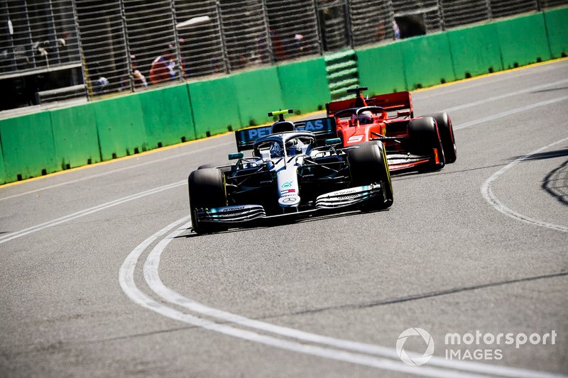 Valtteri Bottas, Mercedes AMG W10, leads Sebastian Vettel, Ferrari SF90