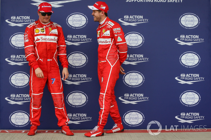 Гонщики Ferrari Кими Райкконен и Себастьян Феттель