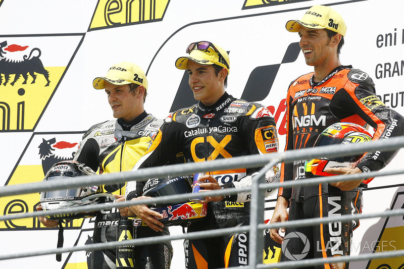 Podio: ganador Marc Márquez, segundo lugar Stefan Bradl y tercer lugar Alex de Angelis