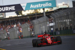 Sebastian Vettel, Ferrari SF71H, takes the chequered flag for victory