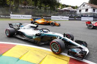 Valtteri Bottas, Mercedes AMG F1 W09, leads Stoffel Vandoorne, McLaren MCL33