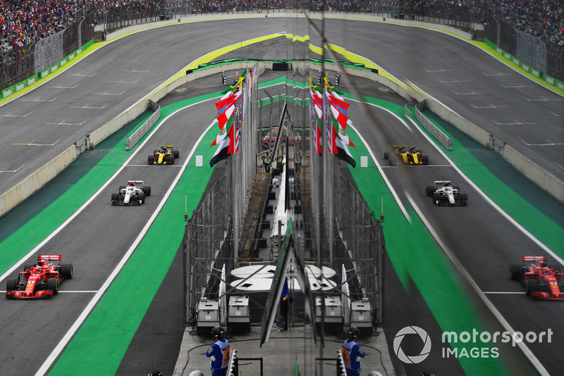Sebastian Vettel, Ferrari SF71H, Charles Leclerc, Sauber C37 and Nico Hulkenberg, Renault Sport F1 Team R.S. 18