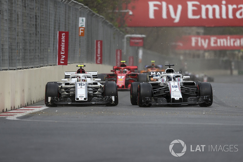 Charles Leclerc, Sauber C37, Lance Stroll, Williams FW41 battle