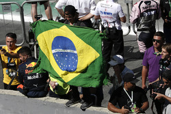 Fan with Brazilian flag at the podium celebrations
