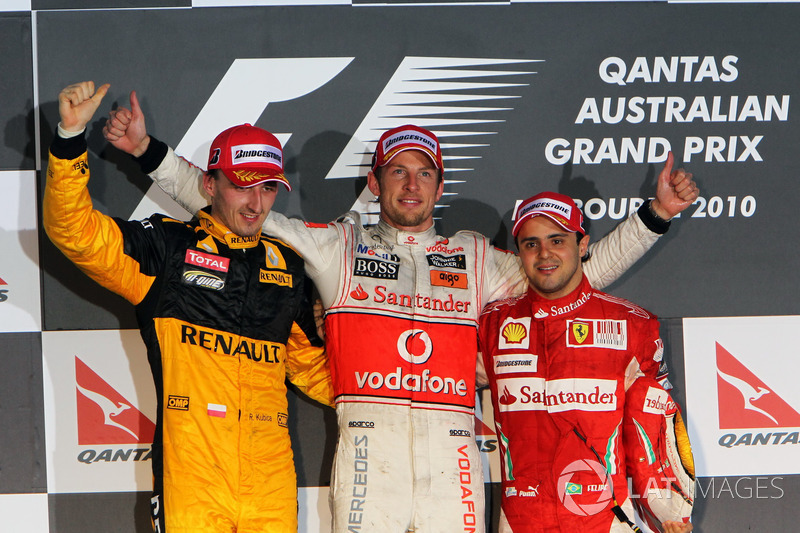 Podium: second place Robert Kubica, Renault F1 Team, Race winner Jenson Button, McLaren, second plac