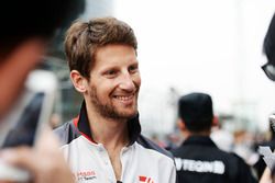 Romain Grosjean, Haas F1 Team signs autographs for the fans