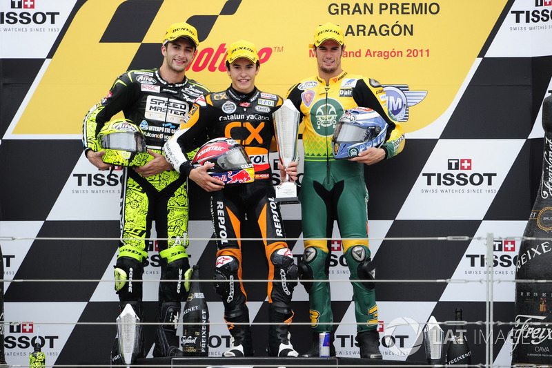 Podium: second place Andrea Iannone, Race winner Marc Marquez, third place Simone Corsi