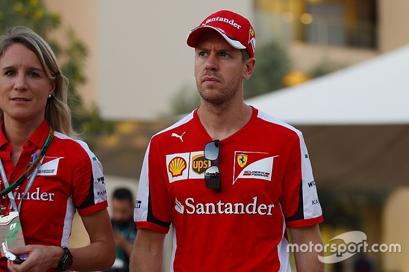 Sebastian Vettel, Ferrari with Britta Roeske, Ferrari Press Officer