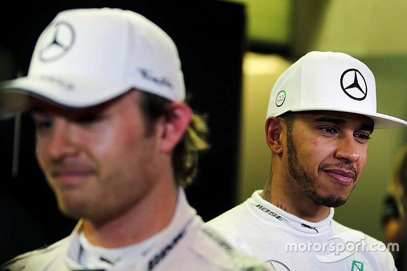Nico Rosberg, Mercedes AMG F1 with team mate Lewis Hamilton, Mercedes AMG F1