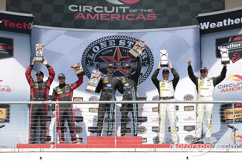 Podium: race winners #10 Wayne Taylor Racing Corvette DP: Ricky Taylor, Jordan Taylor, second place #31 Action Express Racing Corvette DP: Eric Curran, Dane Cameron, third place #5 Action Express Racing Corvette DP: Joao Barbosa, Christian Fittipaldi