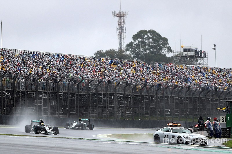 Lewis Hamilton, Mercedes AMG F1 W07 Hybrid leads behind the FIA Safety Car