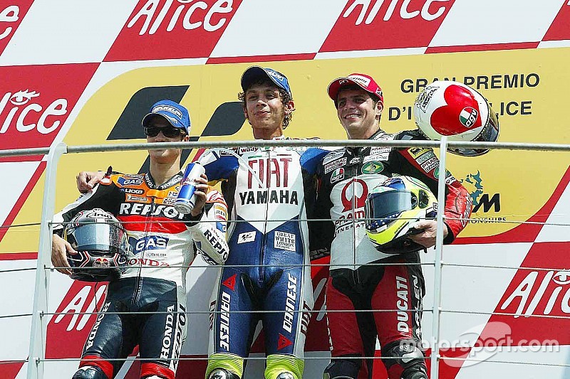 Podium: race winner Valentino Rossi, second place Dani Pedrosa, third place Alex Barros