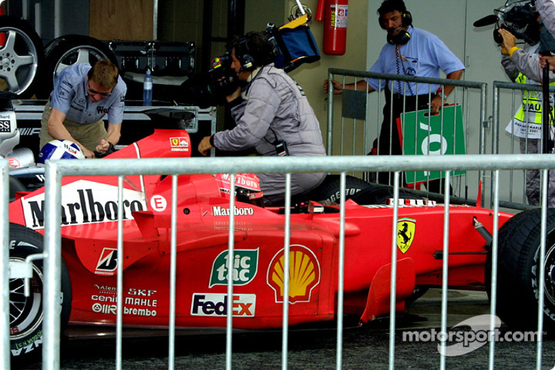 David Coulthard and Michael Schumacher in the parc ferme