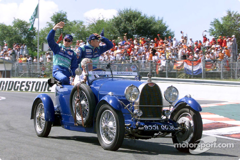 Drivers parade: Nick Heidfeld and Kimi Raikkonen