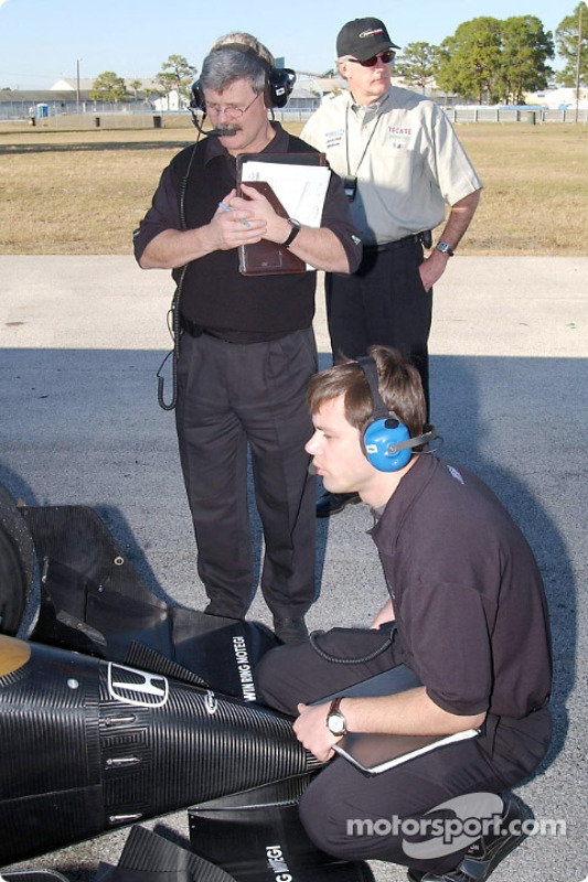 Martin Paré debriefs with Nakano while Don Halliday looks on