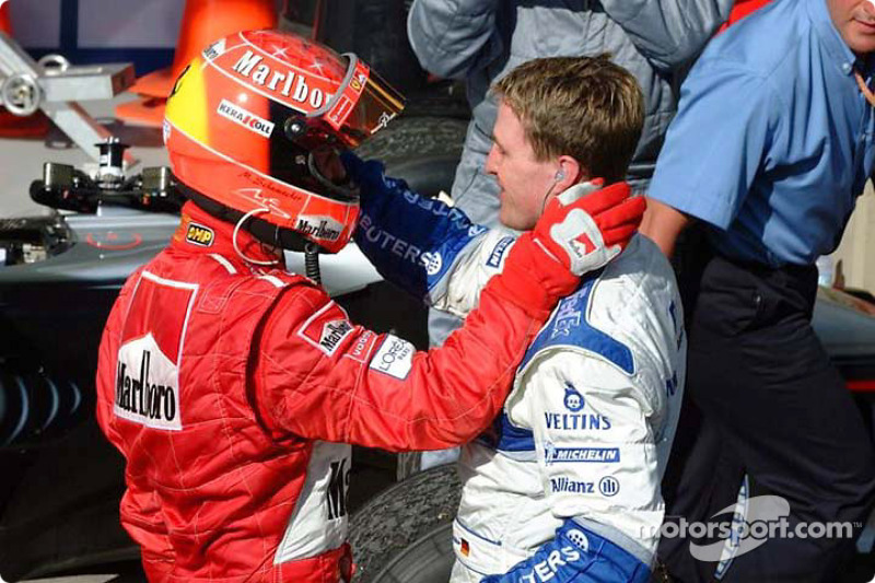 El ganador de la carrera, Michael Schumacher y su hermano Ralf