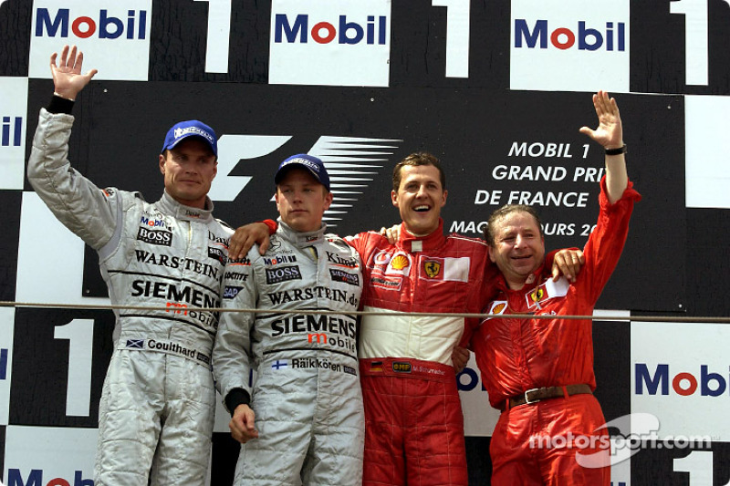 El podio: David Coulthard, Kimi Raikkonen, Michael Schumacher y Jean Todt