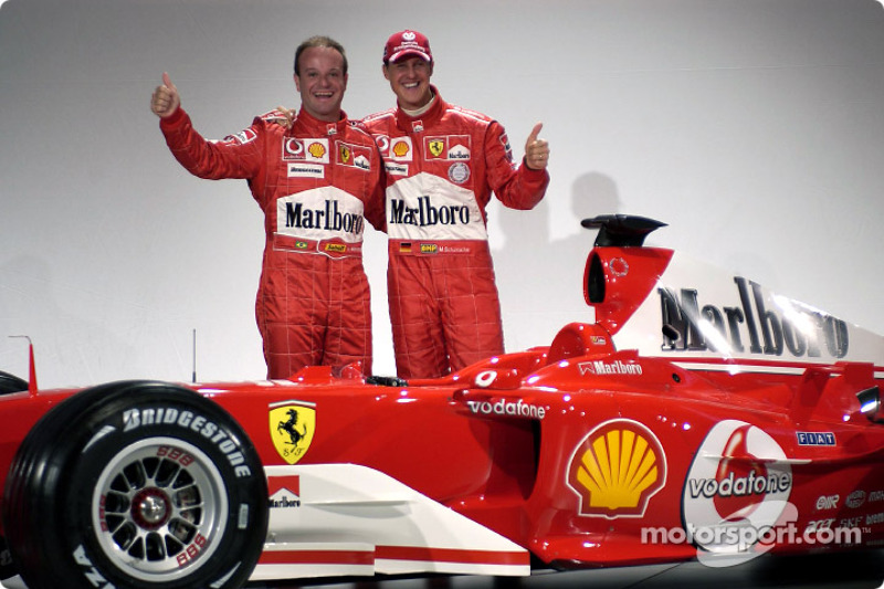 Rubens Barrichello and Michael Schumacher with the new Ferrari F2004
