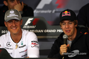Michael Schumacher, Mercedes GP, Sebastian Vettel, Red Bull Racing