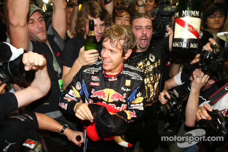 Race winner and 2010 Formula One World Champion Sebastian Vettel, Red Bull Racing, celebrates with his team