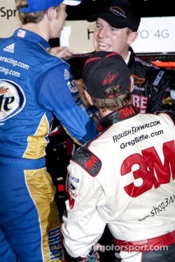 Victory lane: race winner Regan Smith, Furniture Row Racing Chevrolet celebrates with Brad Keselowski, Penske Racing Dodge and Greg Biffle, Roush Fenway Racing Ford