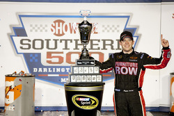 Victory lane: race winner Regan Smith, Furniture Row Racing Chevrolet celebrates