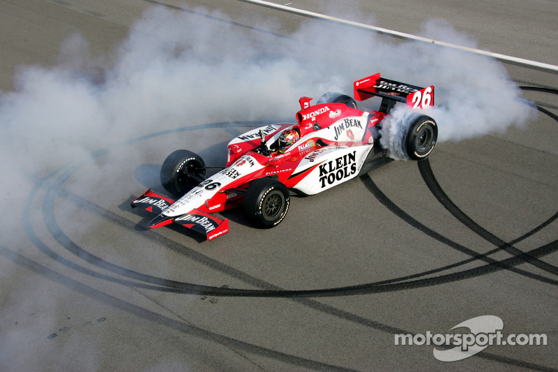 Race winner Dan Wheldon celebrates