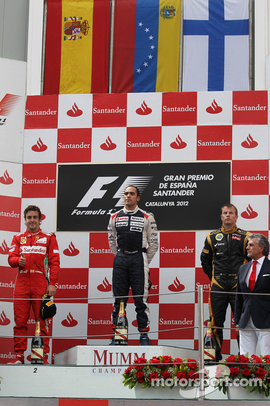 podium and results, 1st place Pastor Maldonado, Williams F1 Team with 2nd place Fernando Alonso, Scuderia Ferrari and 3rd place Kimi Raikkonen, Lotus Renault F1 Team