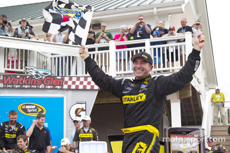 Victory lane: winner Marcos Ambrose celebrates