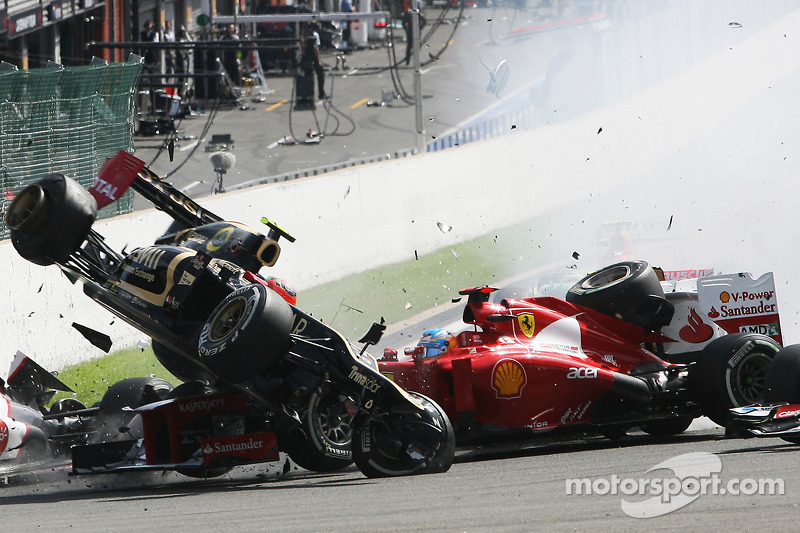 A crash at the start involving Lewis Hamilton, McLaren, Romain Grosjean, Lotus F1, Fernando Alonso, Ferrari, Kamui Kobayashi, Sauber