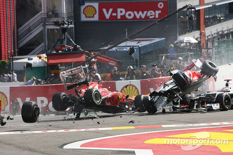 A crash at the start involving Lewis Hamilton, McLaren, Romain Grosjean, Lotus F1, Fernando Alonso, Ferrari, Kamui Kobayashi, Sauber