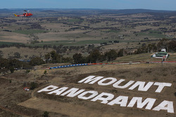 The special Bathurst livery for Team Vodafone is delivered to the track via helicopter