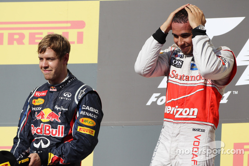 Race winner Lewis Hamilton, McLaren celebrates on the podium