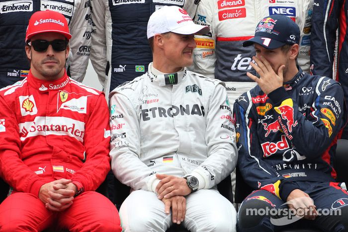 Fernando Alonso, Scuderia Ferrari, Michael Schumacher, Mercedes GP, y Sebastian Vettel, Red Bull Racing