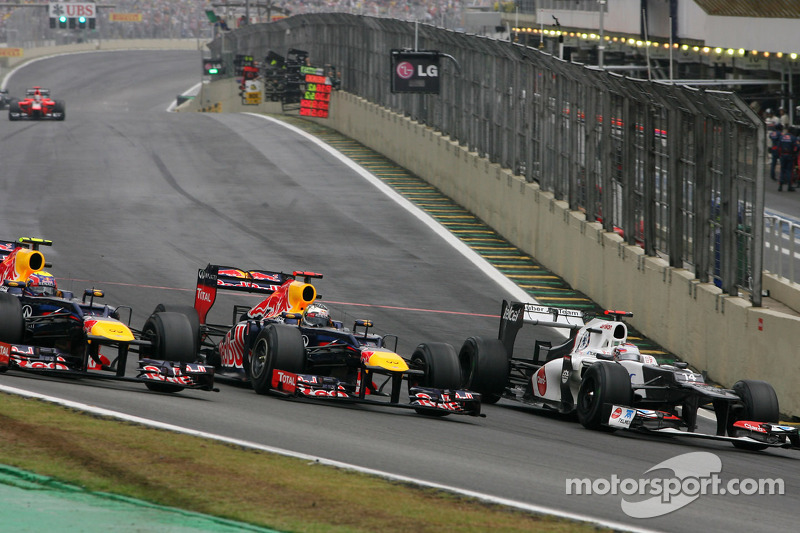 Марк Феббер (Red Bull), Себастьян Феттель (Red Bull) Камуї Кобаясі (Sauber)