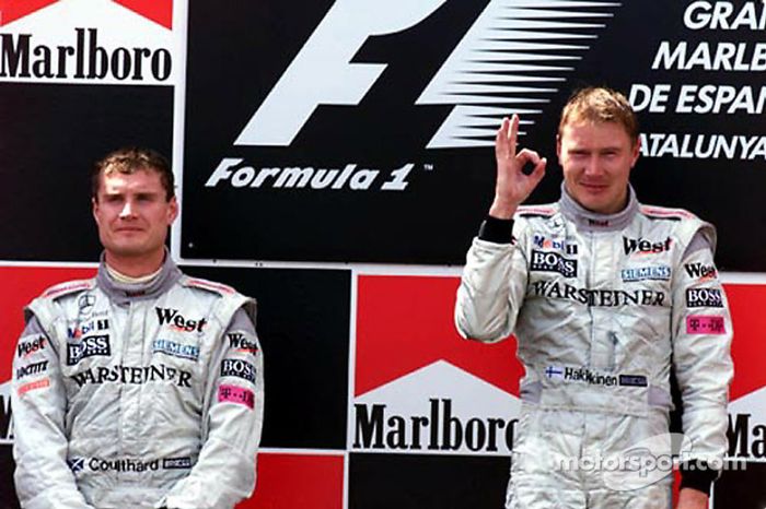 Podium: race winner Mika Hakkinen, second place David Coulthard