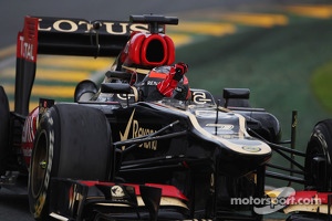 Race winner Kimi Raikkonen, Lotus F1 E21 celebrates at the end of the race