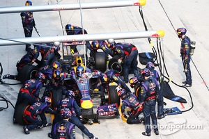 Sebastian Vettel, Red Bull Racing RB9 makes a pit stop