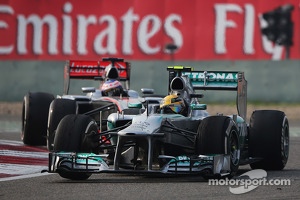 Lewis Hamilton, Mercedes AMG F1 W04 leads Jenson Button, McLaren MP4-28
