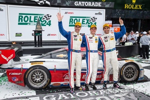 P class victory lane: class and overall winners Christian Fittipaldi, Joao Barbosa and Sébastien Bourdais