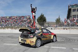 Winner Petter Solberg celebrates