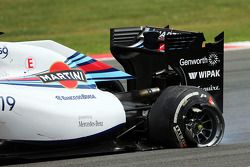 Felipe Massa, Williams FW36 with a punctured rear tyre and damaged rear suspension