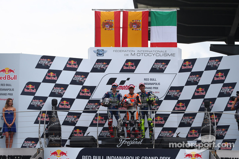 Podium: race winner Marc Marquez, second place Jorge Lorenzo, third place Valentino Rossi